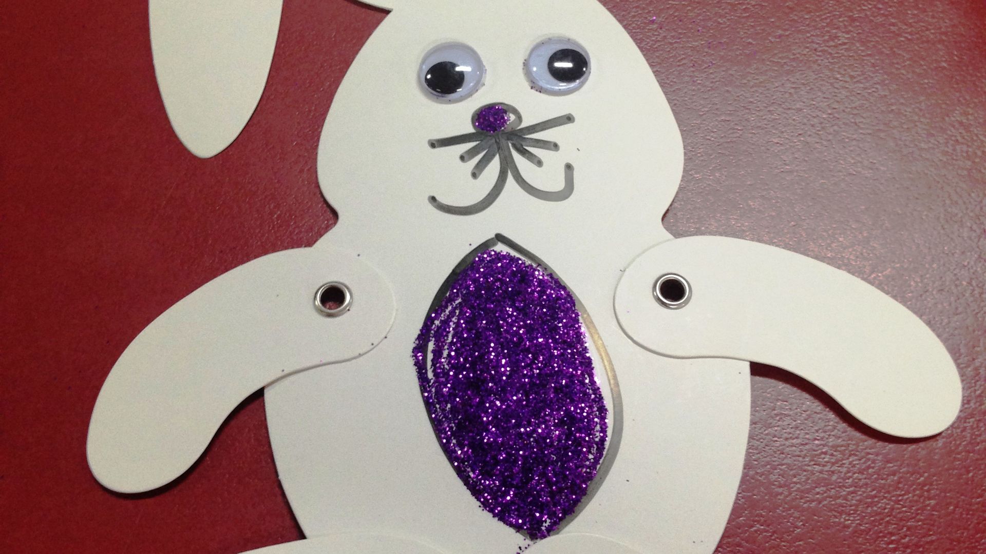 Shake glitter onto the PVA-coated area. Shake glitter onto the PVA-coated area.